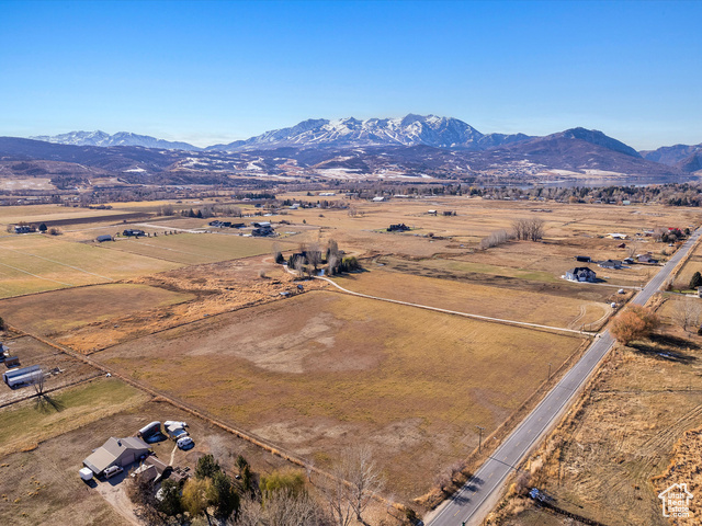 Drone / aerial view featuring a mountain view and a rural view