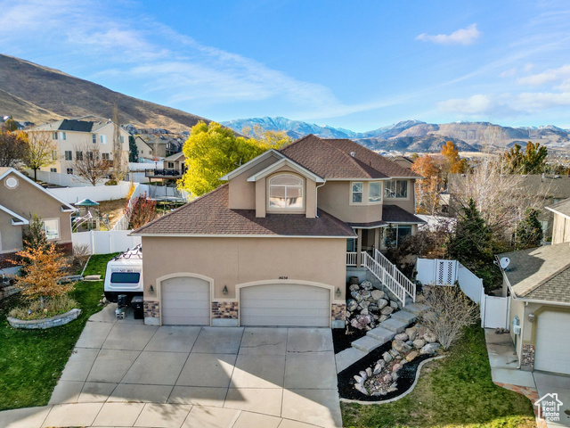 View of front property with a mountain view