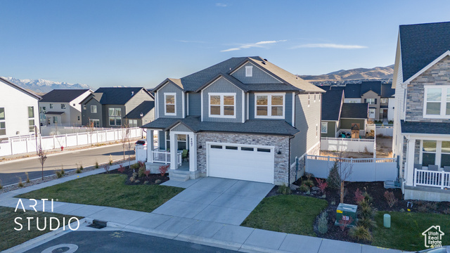 DON'T MISS OUT on this Beautiful Edge Morgan home with a Scandinavian style front. The base Morgan model in Mountain Ridge sells for $723,000. This is far from a base model! The owners have done $90,000 in upgrades (ask your agent for a list of upgrades). $813,000-valued home is selling for $770,000. PRICED TO SELL! Coveted large corner lot at .17 acres. The heart of the home is a spacious, open-concept-living area with high 9-foot ceilings in the kitchen and abundant natural light, perfect for family gatherings and entertaining. The chef's kitchen is a culinary delight with sleek cabinetry, a large island, and state-of-the-art, top-of-the line kitchen appliances. The luxurious master suite offers a peaceful retreat, complete with dual vanities, and a substantial walk-in closet. Enjoy spectacular mountain views from your cozy front porch or take advantage of the well-appointed outdoor spaces that await your personal touch. Situated on a quiet street with easy access to local amenities, schools, and outdoor recreation, this home blends comfort and convenience. Two-minute drive to Mountain View Village with first class restaurants, retail, and entertainment experiences. Don't miss the opportunity to own this exquisite property, ready to create memorable experiences for years to come!