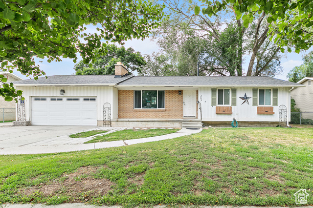 Unlock the possibilities in Midvale! This charming 5-bedroom, 2-bathroom home on a .21-acre lot features an extra large attached 2-car garage and RV parking. Ideally located near schools, parks, and a community rec center, with easy access to I-15 (just 6 minutes away). Enjoy plenty of outdoor space in a prime location. Separate entrance has been added to  the basement for a future mother-in-law suite conversion. Don't miss out on this unique find  schedule a tour today!  Square footage figures are provided as a courtesy estimate only and were obtained from county records.  Buyer is advised to obtain an independent measurement.