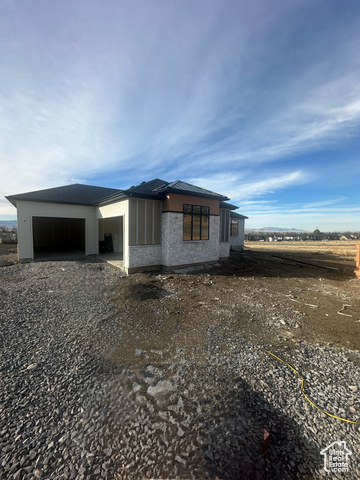 Exterior space featuring a garage