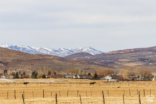 View of mountain feature with a rural view