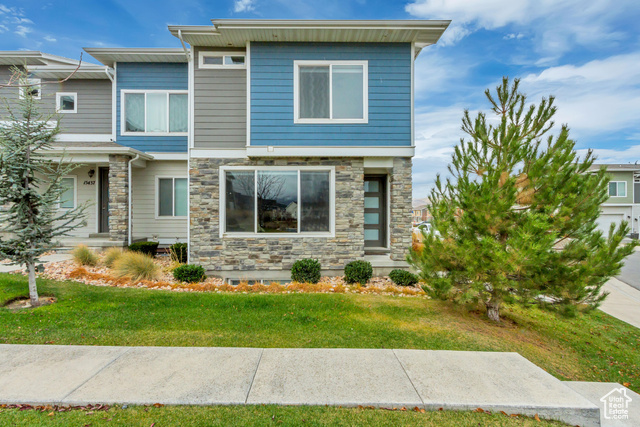 This beautiful townhome is move-in ready and offers a fully finished basement, four bedrooms and 3 bathrooms! The main floor features an open-concept living area with natural light and fantastic scenic views of Lone Peak. The kitchen is nicely appointed with shaker cabinets, granite countertops, under-mount lighting and stainless appliances, The well-thought-out design provides ample storage with walk-in and several storage closets. Community swimming pool, picnic and playground areas. You don't want to miss this spotless home with quick and easy access to I-15, Redwood Road and Mountain View Corridor. Square footage is provided as a courtesy only.