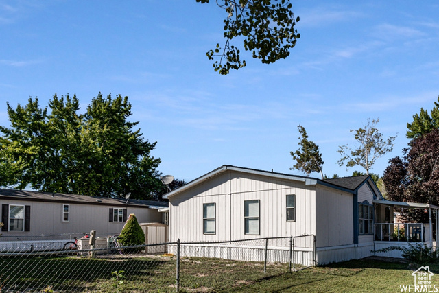 View of home's exterior featuring a yard