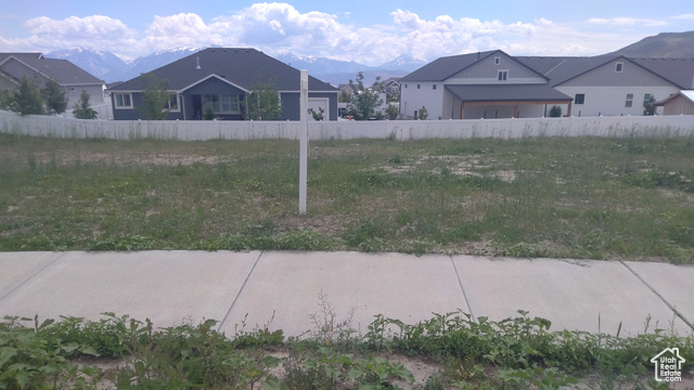 View of yard with a mountain view