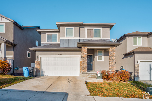 View of front of house featuring a garage