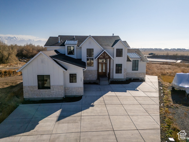 Welcome to your dream home in Lehi, Utah! This stunning, newly built custom residence boasts unique character and modern elegance throughout. With an expansive floor plan, there's ample space for both relaxation and entertainment. The oversized garage offers extra storage and convenience, while the impressive deck invites you to enjoy serene outdoor living with breathtaking views. Sunlight floods the interior through large windows, highlighting the high-end finishes and thoughtful design elements. Nestled in a desirable neighborhood, this home combines luxury with comfort, creating the perfect sanctuary. Don't miss the opportunity to own a piece of architectural excellence-schedule your private tour today!  Square footage figures are provided as a courtesy estimate only and were obtained from county records.  Buyer is advised to obtain an independent measurement.