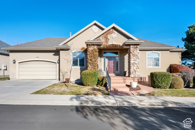 Beautiful rambler in the heart of South Jordan, located in a gated community with friendly neighbors and incredible amenities.  The main level boasts hardwood flooring, tall ceilings, and an open design - perfect for entertaining. Spacious primary suite features a large walk-in closet, an ensuite bathroom with a walk-in tub, separate shower, double sink vanity, and private water closet. An additional bedroom and a  bathroom are also on main level. The updated kitchen includes a large island, granite countertops, stainless steel appliances, and a gas range, opening to semi-formal dining area and a cozy family room with a fireplace. Finished basement includes a wet bar with an island and granite countertops. Huge family room, two additional bedrooms, a bathroom, and a large storage room. Step outside to the covered deck and expansive patio, perfect for hosting gatherings or enjoying stunning mountain views. Has a two car garage with true two car driveway. The home is next to peaceful open space and near extra parking. The community clubhouse features an exercise room, spa, and swimming pool. Check out video tour and the 3D tour!