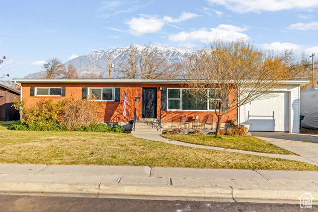 **OPEN HOUSE, SATURDAY JANUARY 18, 2025 FROM 10 AM TO 12 PM**  Prime northeast Orem location. West facing home for wonderful shady summer bbq's with gorgeous mountain views. This home features a remodeled kitchen, bathrooms, brand new basement paint and carpet, updated vinyl windows, a 2 year old furnace and AC unit, and the roof was replaced in 2008. Also, there is a great pantry space in the hallway.  The bedrooms are huge and the basement bathroom is all brand new! Storage galore! Minutes from Provo Canyon, Riverwoods Shopping Center, BYU, UVU, University Mall and more.