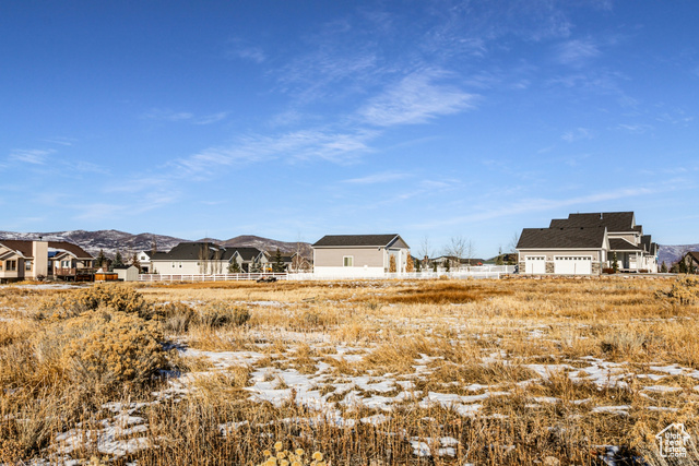 View of yard with a mountain view