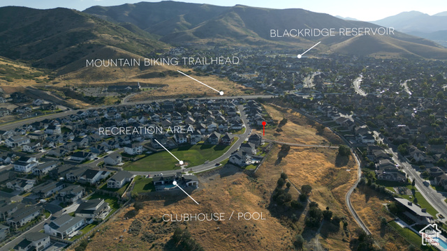 Birds eye view of property with a mountain view