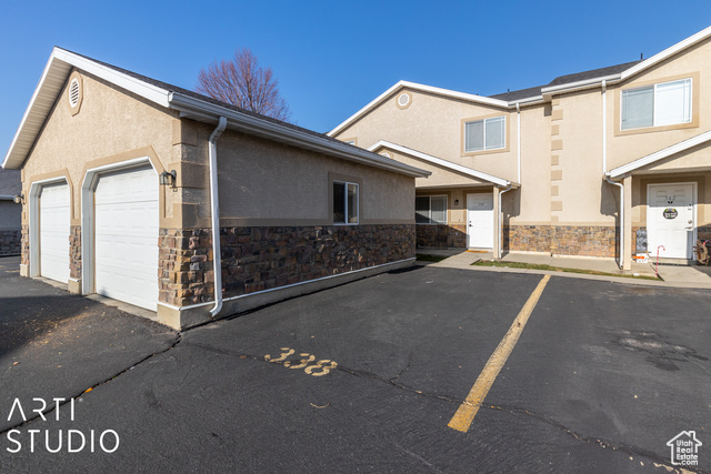 Exterior space featuring a garage