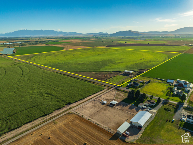 Bird's eye view of the properties approximate boundaries featuring a mountain view and neighboring farmers