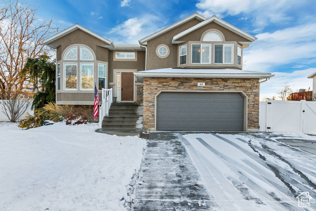 View of front of house with a garage