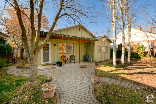 Back of property featuring a patio