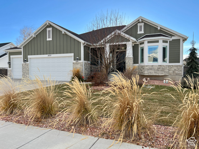 Craftsman-style house with a garage