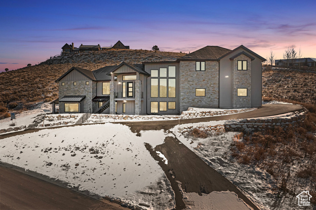 **Seller and Creative Financing Available** Discover this stunning 5 bed 6 bath 6,400 sq. ft. custom-built luxury home perfectly located in one of the most desired communities in Heber City. Just 10 minutes from the new Mayflower Ski Resort. Enjoy breathtaking views of Mount Timpanogos from many angles of the home. Very private home with an adjacent lot that can never be built on. Designed with high-end finishes throughout, this home features heated floors for ultimate comfort and a spacious accessory dwelling unit (ADU) for added versatility. The massive 6-car garage, complete with sleek epoxy flooring, offers ample space for vehicles and storage. Nestled in a desirable location with quick access to world-class skiing and outdoor recreation, this estate is a true retreat that combines elegance, functionality, and unparalleled mountain living. Don't miss the opportunity to make this one-of-a-kind property your own!   Square footage figures are provided as a courtesy estimate only and were obtained from building plans.  Buyer is advised to obtain an independent measurement.