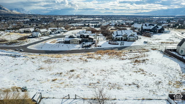 Snowy aerial view with a mountain view