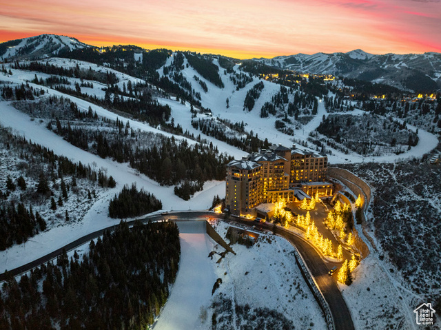 Rare, One-of-a-kind, West-Facing St. Regis Deer Valley Residence with Stunning Ski Slope Views. This rare, one-of-a-kind, west-facing St. Regis Deer Valley residence spans over 3,000 square feet and features three bedrooms, four and a half bathrooms, and an oversized living room connected to a family room. Residence was completely customized with a remodel of systems, & interiors. Special upgrades include chestnut floors, wall & window coverings,  lighting, sound system and more. Incredible southwest-facing ski run views of the slopes of Deer Valley Resort. Custom furnishings, exquisite details, and the finest finishes are found throughout every room of this stunning residence. Ownership includes access to St. Regis Deer Valley hotel amenities, including concierge services, ski valet, drivers, private owner storage locker, a dedicated parking spot, and more. The property offers a perfect blend of luxury and comfort, with expansive spaces designed for both relaxation and entertaining.