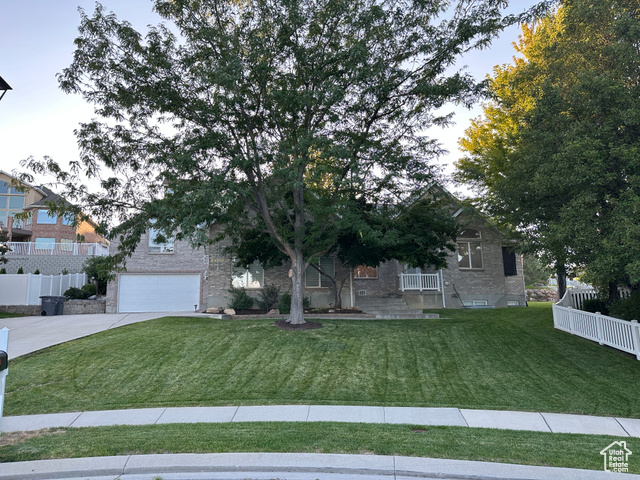 Beautiful brick home on the 16th hole of the Glenmoor Golf Course with lovely yard and mature trees. Includes a $160K detached studio apartment (484 SF) with separate garage! Excellent rental opportunity. Beautiful views of the Wasatch mountains. Excellent neighborhood with quick access to shopping, multiple parks, and freeway. Plumbed and wired for an optional second kitchen downstairs. Square footage figures are provided as a courtesy estimate only and were obtained from the general contractor. Buyer is advised to obtain an independent measurement.