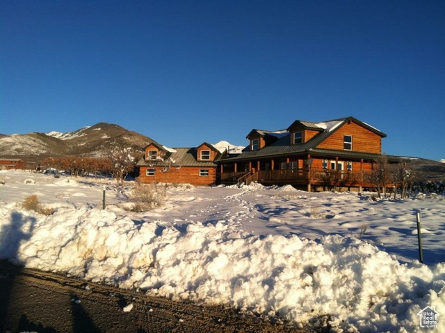 View of front of house featuring a mountain view