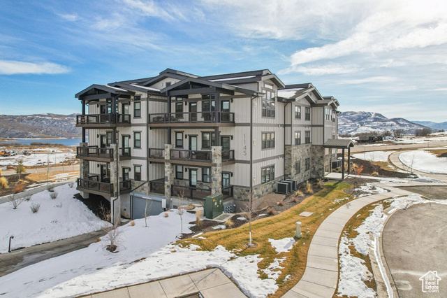 Experience luxury mountain living with this stunning top-floor 3-bedroom, 2-bathroom condo at Mayflower Lakeside. Featuring Viking appliances, solid granite countertops, and rich hardwood floors, this home offers both comfort and elegance. Relax on your private balcony and soak in breathtaking views of the mountains and the serene Jordanelle Reservoir. Nestled between world-class ski resorts and the peaceful waters of Jordanelle, this property delivers the perfect four-season lifestyle. With only two minutes to the lifts at the new Deer Valley East Village and the Jordanelle gondola at Deer Valley, adventure is always within reach. Whether you're hitting the slopes in winter or enjoying summer activities like boating, paddleboarding, and hiking, adventure is always within reach. Just 15 minutes from Park City's vibrant Main Street, you'll have access to upscale dining, shopping, and entertainment, while Salt Lake City International Airport is less than an hour away for easy travel. Ideal for luxury home seekers, outdoor enthusiasts, and ski lovers, this condo is your ultimate mountain escape. Don't miss this rare opportunity-your dream lifestyle awaits!