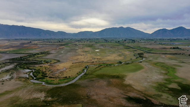 Birds eye view of property with a mountain view and a rural view