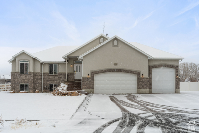 View of front of home with a garage