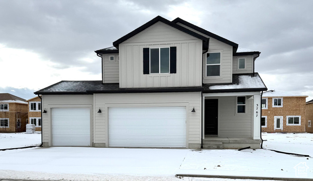 View of front facade with a garage