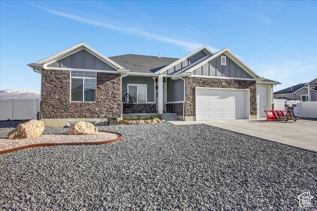 View of front of home featuring a garage