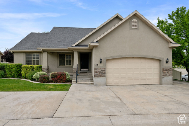 View of front of home with a garage