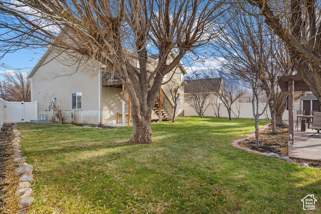 View of yard with a patio