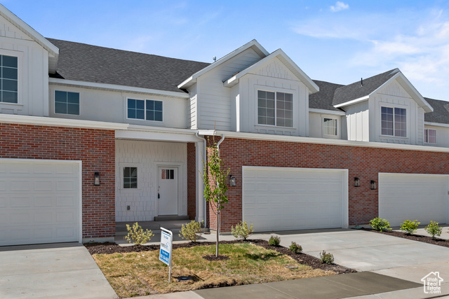 Multi unit property featuring a garage