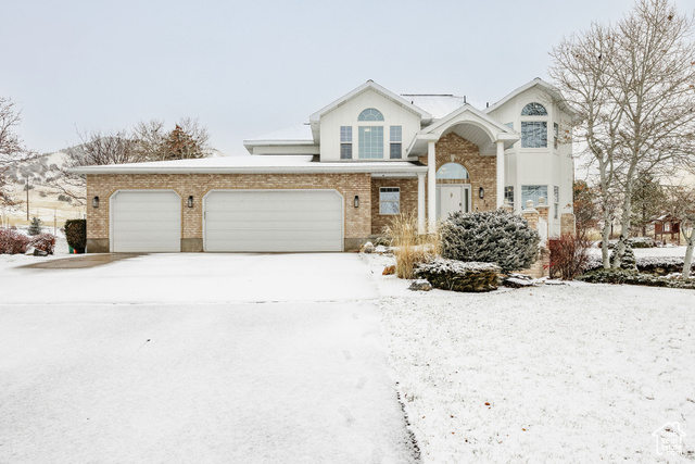 Front facade featuring a garage