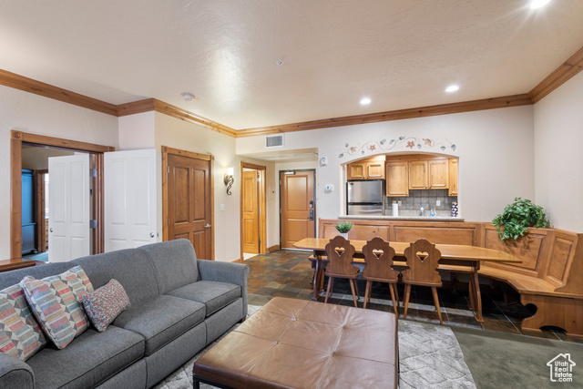 Living room with ornamental molding