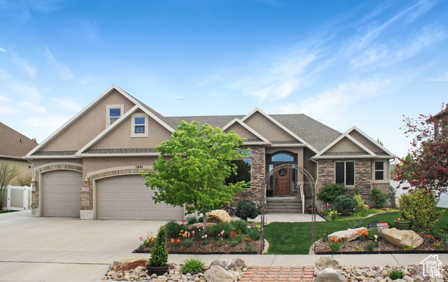 Craftsman-style home with a garage