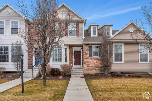 View of front of home with a front lawn