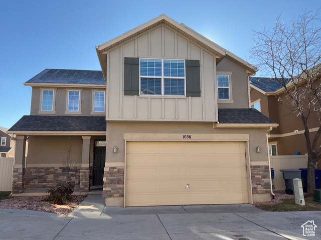 View of front of home with a garage