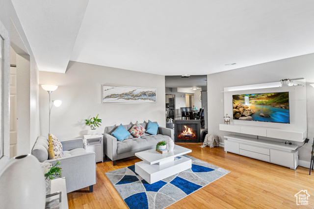 Living room with hardwood / wood-style floors