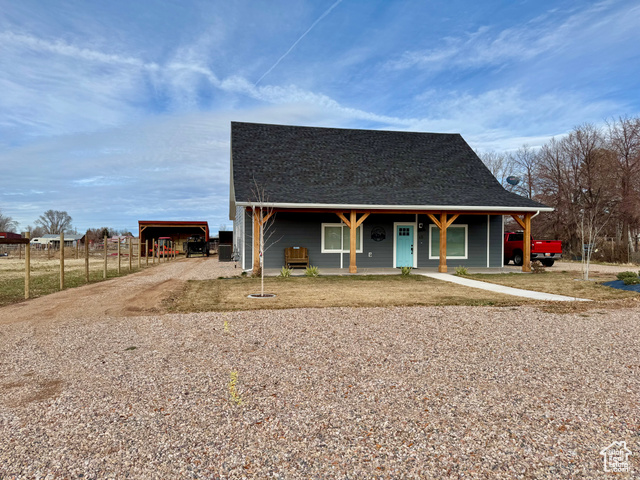 View of front of home featuring covered porch