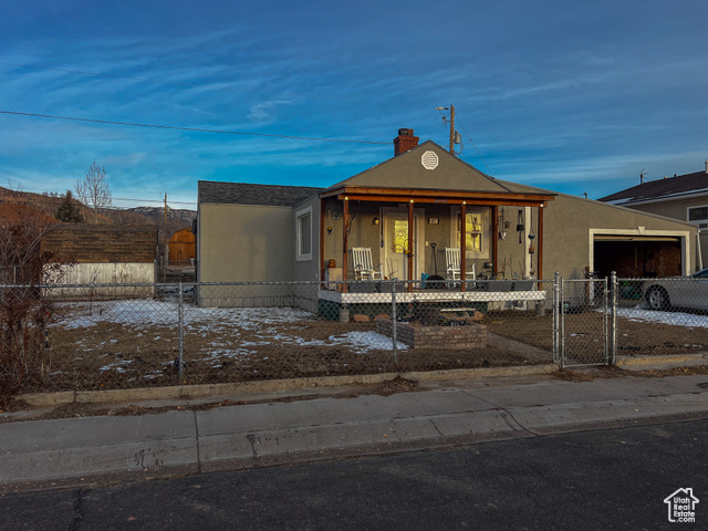 View of front of property featuring covered porch