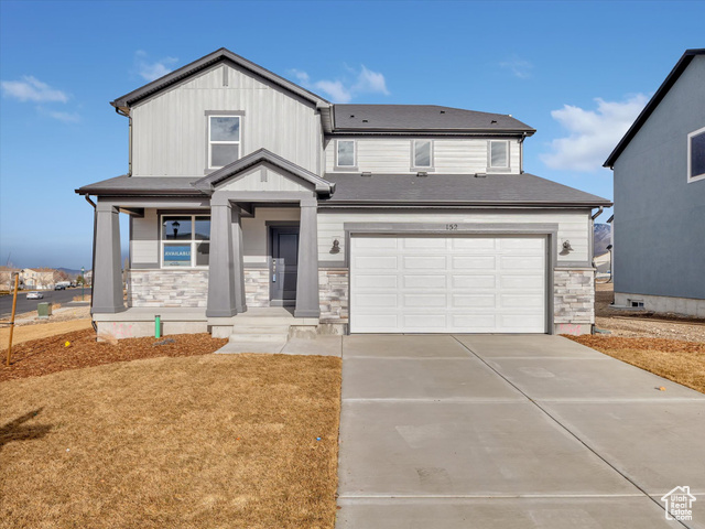 View of front of home with a garage