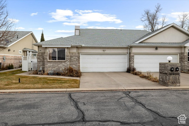 Ranch-style house with a garage