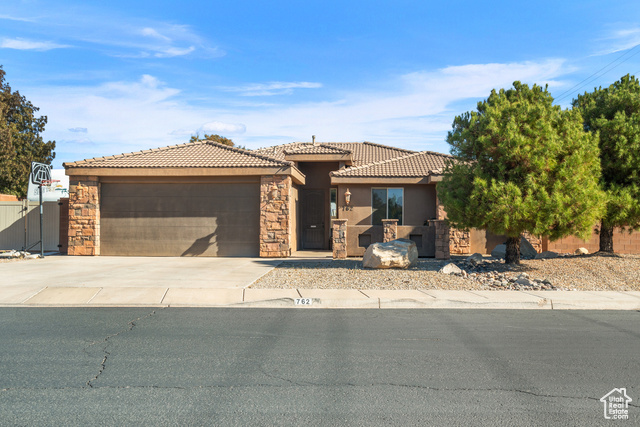 View of front of house with a garage