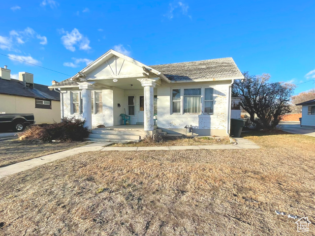 Bungalow-style house featuring a porch