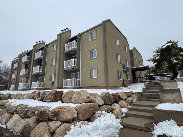 View of snow covered property