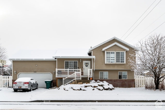 Tri-level home featuring a garage