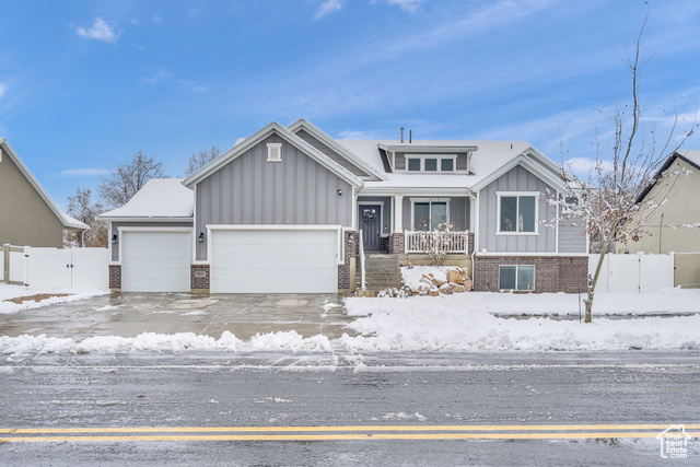 View of front of property with a garage