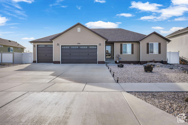 Single story home featuring a garage