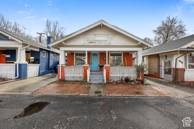 View of front of house with covered porch